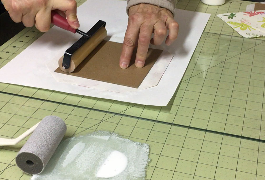 Use a brayer when gluing your book covers