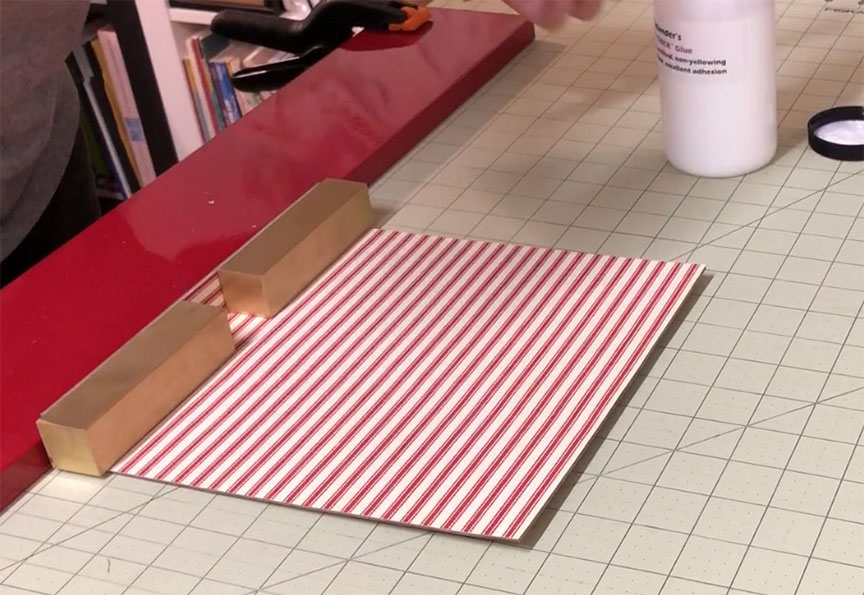 Put Weights on Sides While Working on Rest of Slipcase